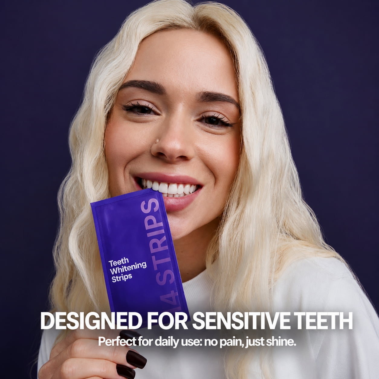Model holding Purple Teeth Whitening Strip