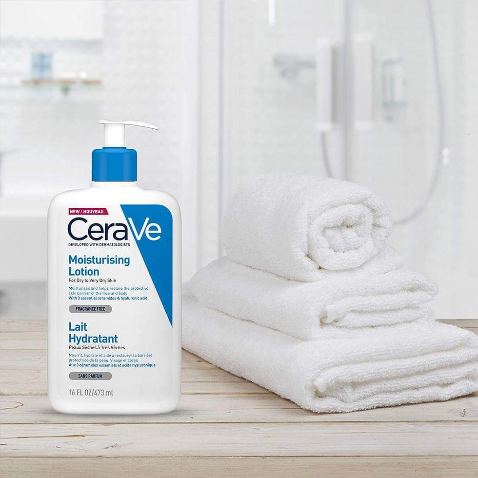 CeraVe Moisturising Lotion bottle beside folded white towels